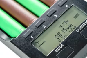 Electronic Charger With Batteries Close Up, Background