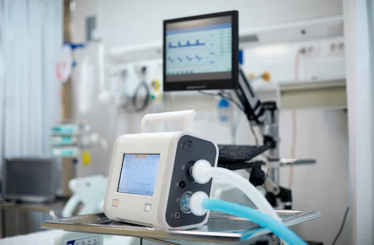 Close Up View Of A Portable Medical Ventilator On A Table